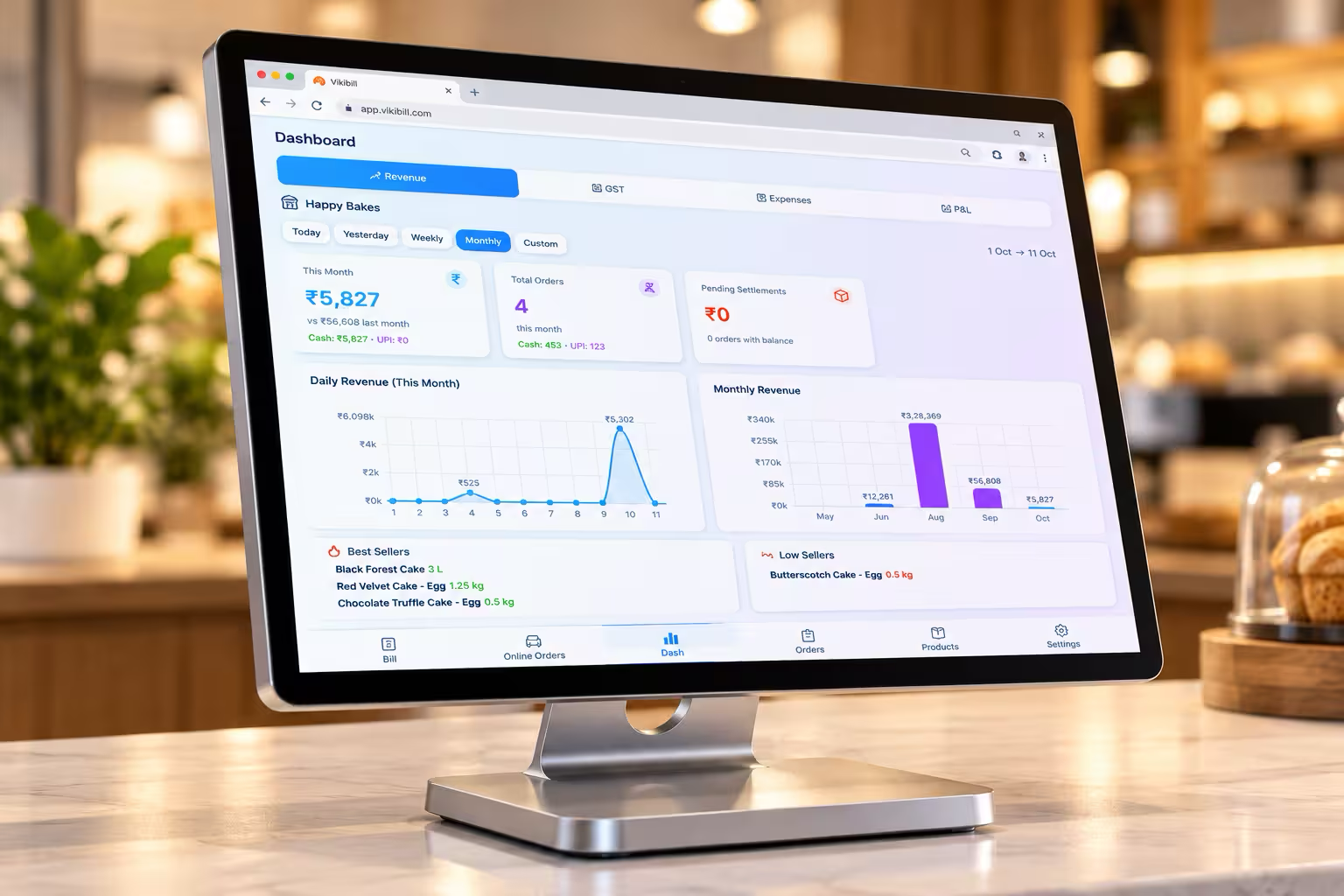 Restaurant owner viewing sales on Vikibill dashboard in a cozy café